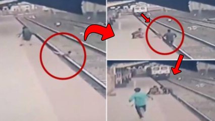 Watch Railway Employee Saves Child Life on Track | Oneindia Telugu