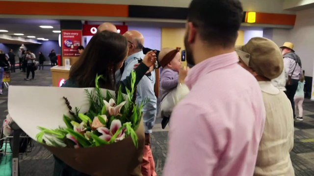 Kia ora! Families rejoice travel bubble reunions at New Zealand airport