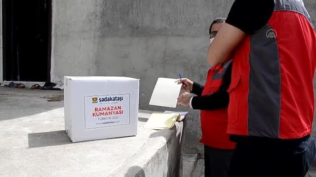 Sadakataşı Derneği 100 aileye yardım kolisi dağıttı