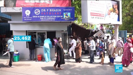 India's capital to lock down amid devastating virus surge