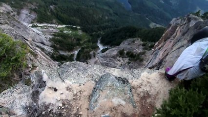 Base Jumpers Leap and Fly off Mountain