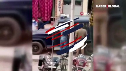 Hindistan'da maske takmadığı için ceza kesen polise tokat attı