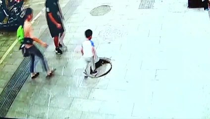 Caught on Camera 3 year old Boy Falls Into Manhole in China