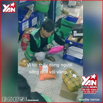 Xót xa nam thanh niên shipper ăn vội, tranh thủ soạn đơn cho kịp giao hàng
