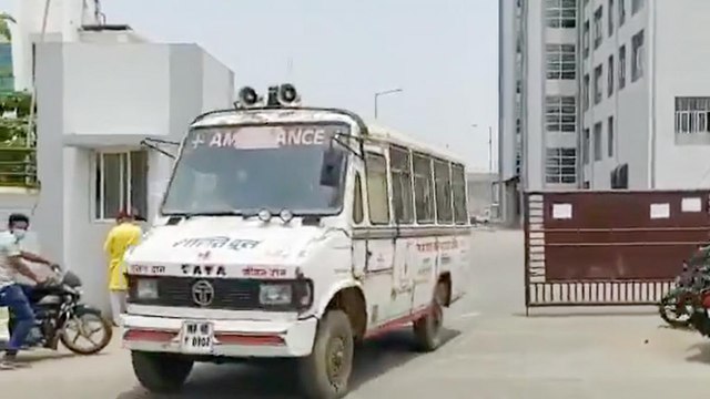 Dead Body falls from Carelessly driven an ambulance
