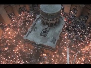 المسيحيون يحتشدون لمشاهدة انبثاق النور الإلهي في كنيسة القيامة  - دارين دعبوس