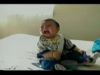 Bébé mort de rire