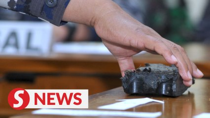 Indonesia finds missing submarine parts, little hope for survivors
