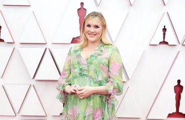 Emerald Fennell takes Best Adapted Screenplay Oscar
