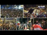 المحتجون يعيدون مجسم قبضة الثورة إلى ساحة الشهداء