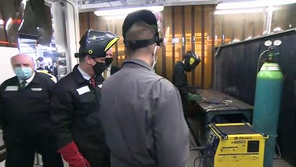 Starmer gets stuck in during visit to college