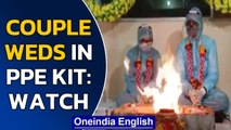 MP couple wed in full PPE kit | Groom tested positive | Oneindia News