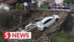 Two cars damaged in Penang landslip