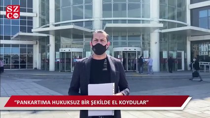 Evinin balkonundan indirilen ‘128 milyar dolar nerede?’ afişini yargıya taşıdı