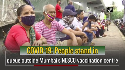 Covid-19: People stand in queue outside Mumbai’s NESCO vaccination centre