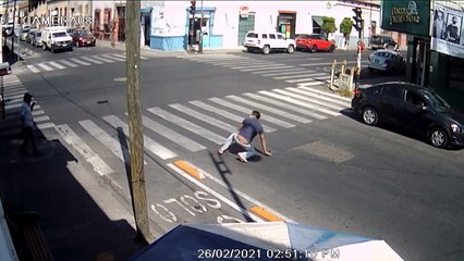 Pedestrian Falls Flat on His Face at Crosswalk
