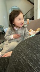 Little Girl Reacts to Baby Brother's Kick in Mom's Tummy