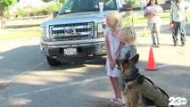 Community members accept dog food donations for local shelters in honor of K-9 Officer Jango