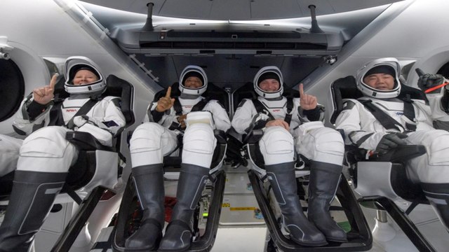 ISS astronauts splash down on SpaceX craft