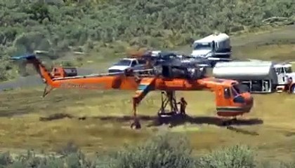 Hepiniz merak ediyordunuz! Kocaman elektrik direkleri nasıl dağ bayır dikiliyor? İşte cevabı...