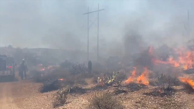 Firefighters battle wind-driven blazes across the Southwest