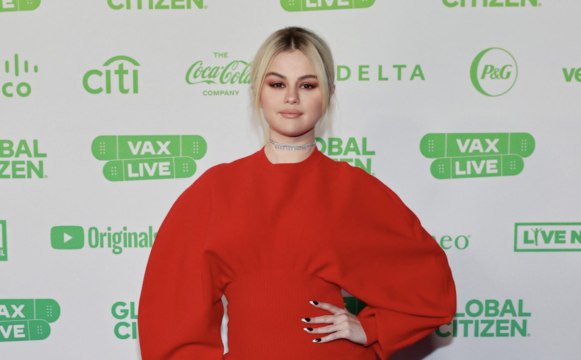 Selena Gomez Showed Off Her Blonde Hair in a Fiery Red Dress and Black Thigh-High Boots