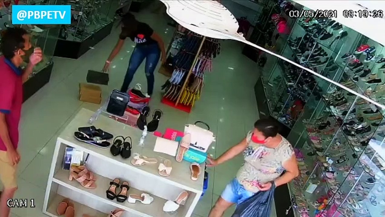 CASAL DE BANDIDO FURTA 7 PARES DE SANDÁLIA EM  LOJA DE ITAMBÉ