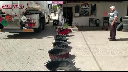 Eski lastiklerden saksı ve süs havuzu yapıyor