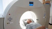 How much does CT scan increase the risk of cancer?