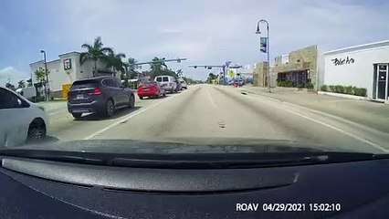 Red Light Runner Skims Truck and Keeps Driving