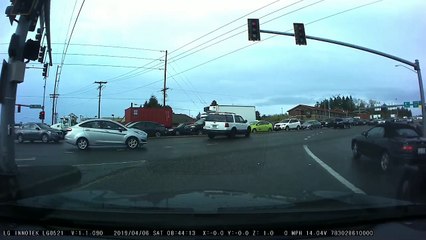 White SUV Takes off After Hitting Prius Taxi