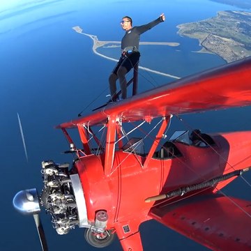 Are You Brave Enough to Walk Around on the Wings of a Biplane While It's Flying at 3,500 Feet?