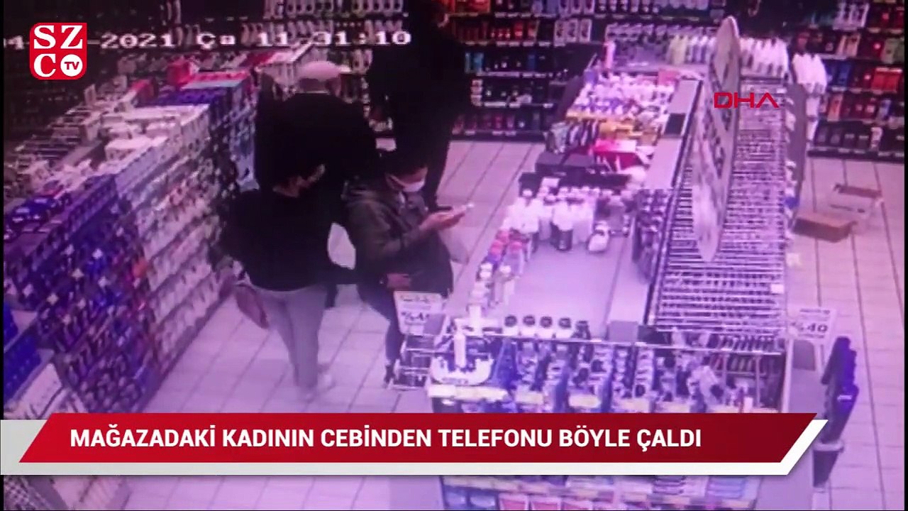 Kadının cep telefonunu böyle çaldı