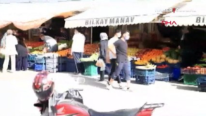 Manavlardaki kalabalığı polis megafonla uyardı