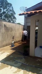 Husband Gets Down as He Hangs Clothes Up