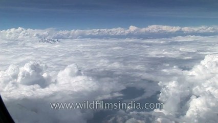 Above the earth, among the clouds