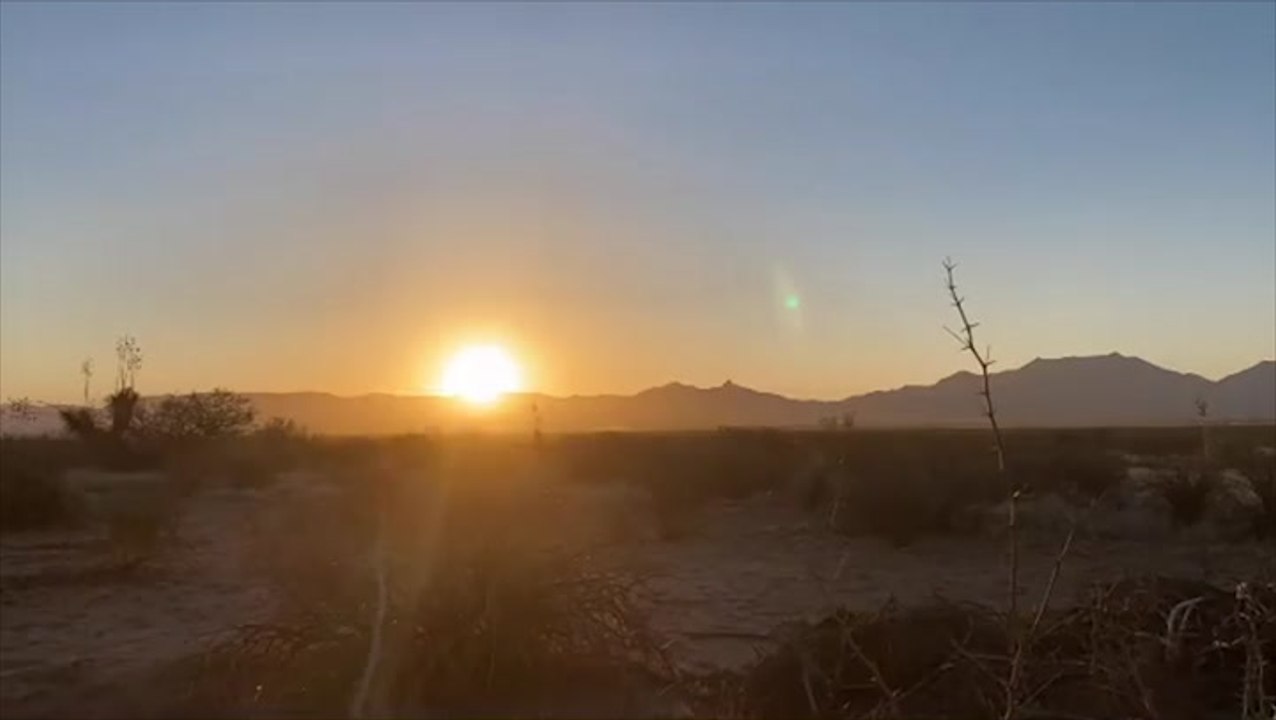 Spring sun rises over a New Mexico desert