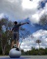 Guy Makes Basketball Trickshot While Balancing on Stability Ball