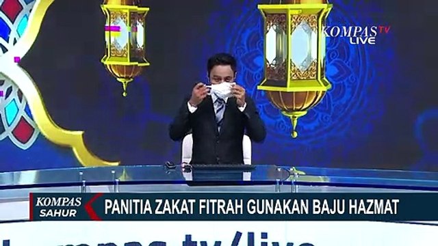 Panitia Zakat Fitrah Gunakan Baju Hazmat dan Tolak Warga yang Tak Pakai Masker