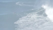 Guy Displays Skills by Surfing Over Gigantic Wave in Sea