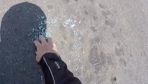 Motorcyclist Saves Cars From Heap Of Screws In The Road