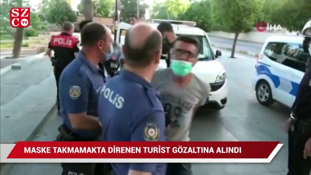 Maske takmamakta direnen turist gözaltına alındı
