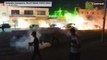 Palestinian protesters and Israeli security forces clash at Qalandia checkpoint