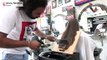 Pakistan barber offers hair-raising cuts with cleavers and blowtorches