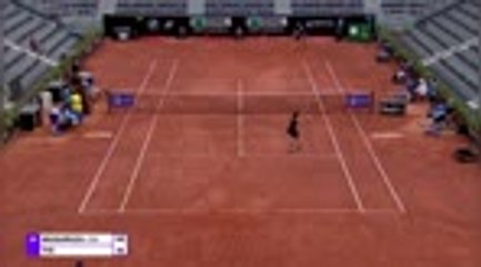 Muguruza powers past Tig in Rome