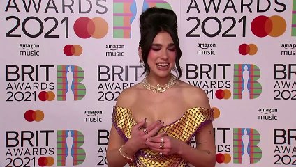 Dua Lipa reacts to winning Brit award saying she's 'ready to go on tour'