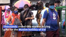 Crowds throng markets in Bangladesh ahead of Eid despite virus regulations