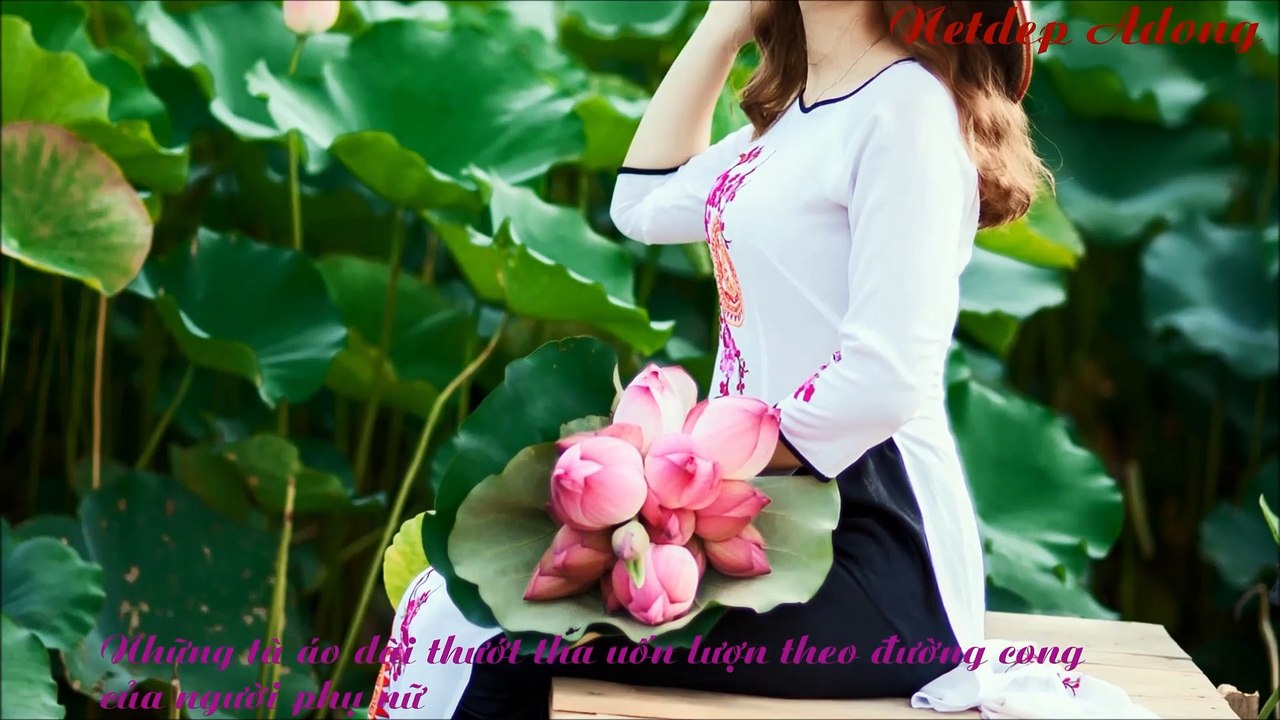 Áo dài nón lá , vẻ đẹp đặc trưng của phụ nữ VN