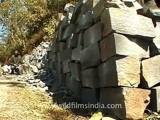 Manual labour - Breaking and chiseling large rocks in Nagaland