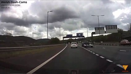 Bad driver. Woman has no lane discipline. UNITED KINGDOM — 2021.05.05